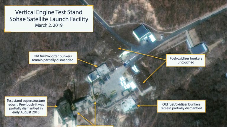 Image showing North Korean rocket launch site restoration at Sohae (Tongchang-ri). The vertical engine test stand as seen on March 2, 2019 showing the stand partially rebuilt. Among the notable items visible are two construction cranes, several vehicles and supplies laying on the ground. (Copyright Â© 2019 by DigitalGlobe) 