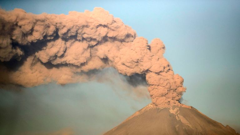 The Popocatepetl Volcano spews ash