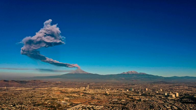 The Popocatepetl Volcano spews ash