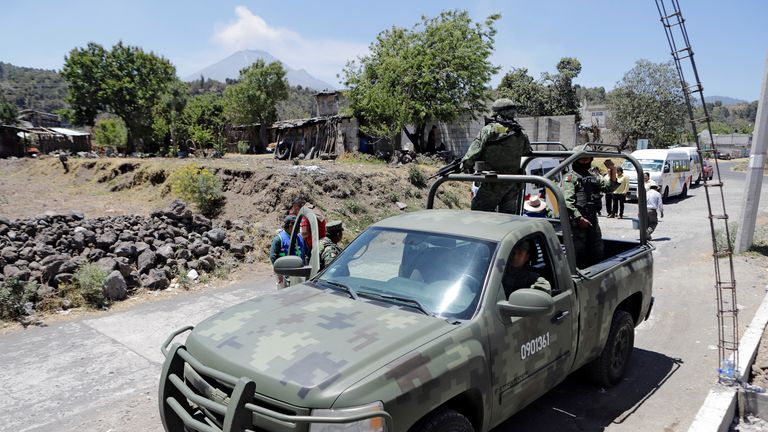 Soldiers check an evacuation route