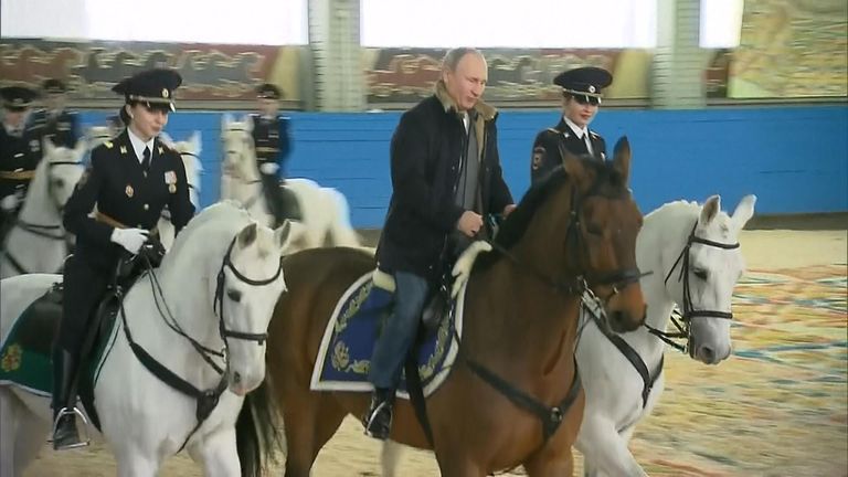 President Vladimir Putin mounted a horse and cantered with female police officers ahead of International Women&#39;s Day.