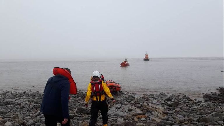 A coastguard helicopter and five lifeboats went searching for the sailors