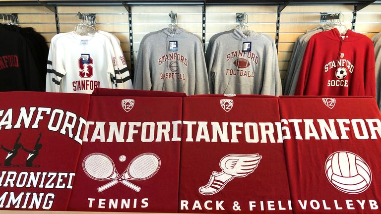 Shirts with the Stanford University logo at the Stanford Athletics Shop on March 12, 2019 in Stanford, California. More than 40 people, including actresses Lori Loughlin and Felicity Huffman, have been charged in a widespread elite college admission bribery scheme. Parents, ACT and SAT administrators and coaches at universities including Stanford, Georgetown, Yale, and the University of Southern California have been charged