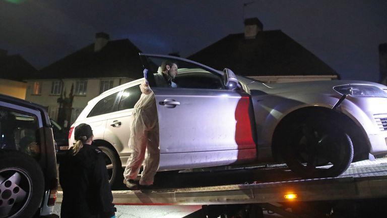 Police remove a car from Viola Avenue in Stanwell, after reports a man had a baseball bat and knife