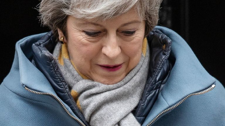 Theresa May leaves following a cabinet meeting at 10 Downing Street
