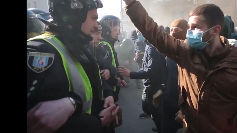 Three police officers in Ukraine were injured after  clashes with far-right demonstrators.
