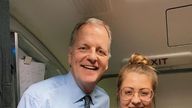 American Airlines CEO Doug Parker (left) and flight attendant Maddie Peters pose together. 