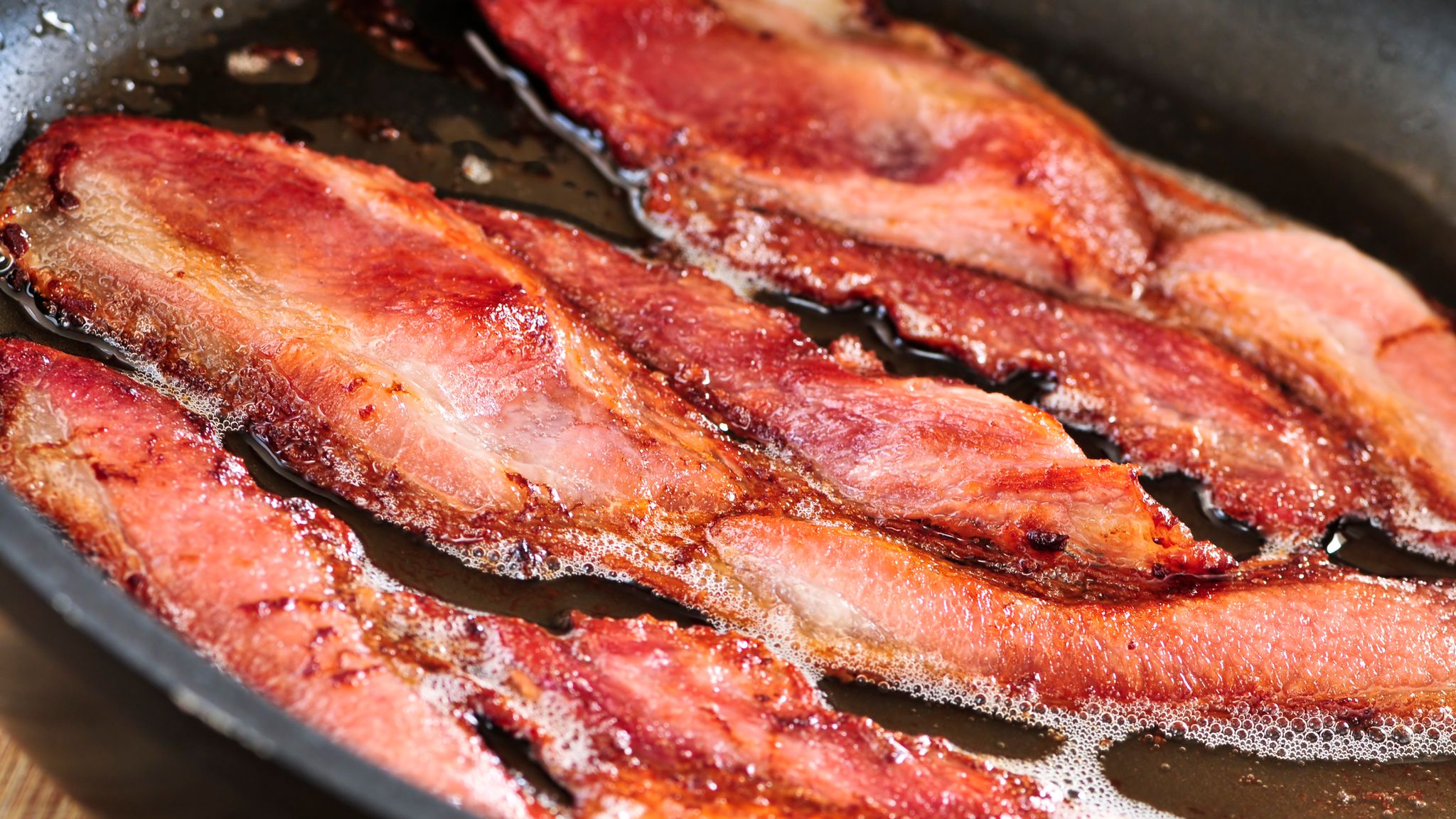 Two rashers of bacon a day raises bowel cancer risk by a fifth UK