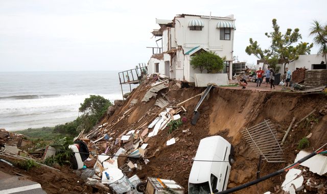 Flooding and mudslides kill at least 60 people in South Africa