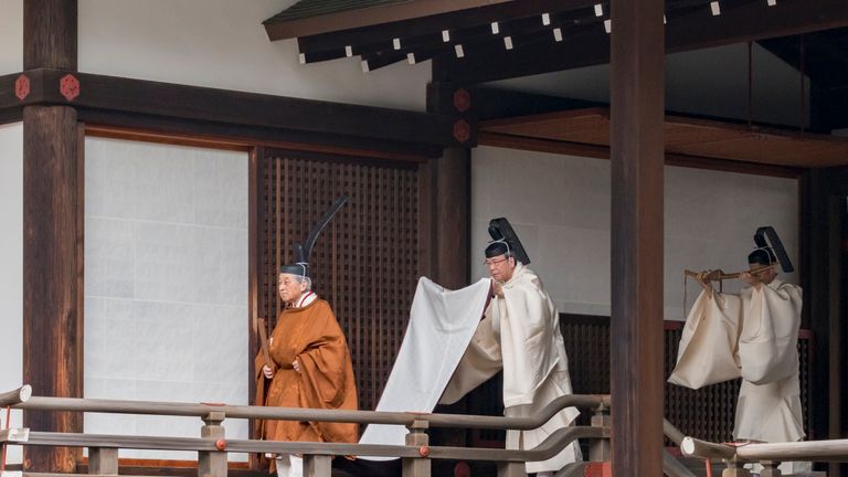 Akihito is seen attending the abdication ceremony at the Imperial Palace