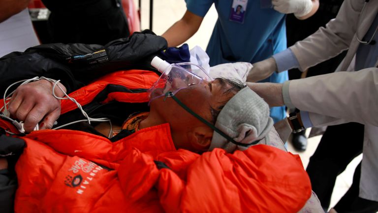 Malaysian climber Wui Kin Chin is being transferred from a helicopter to the hospital for treatment after being rescued form Mount Annapurna in Kathmandu, Nepal April 26, 2019