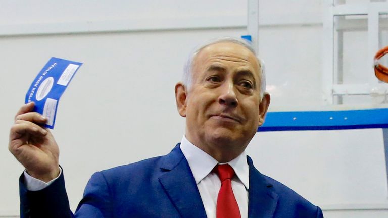 Israel’s Prime Minister Benjamin Netanyahu votes during Israel&#39;s parliamentary election in Jerusalem 