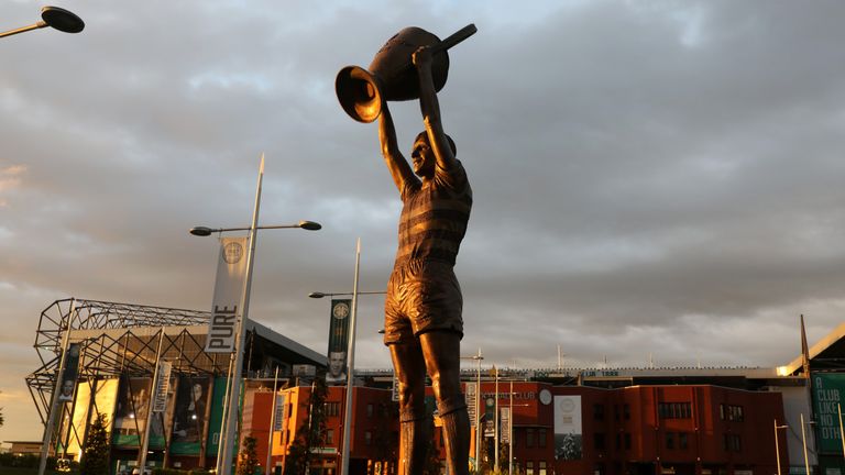 A statue of Billy McNeill holding aloft the European Cup