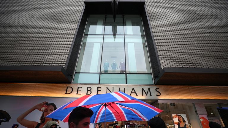 Shoppers walk past Debenhams on Oxford Street in central London 2/4/2018