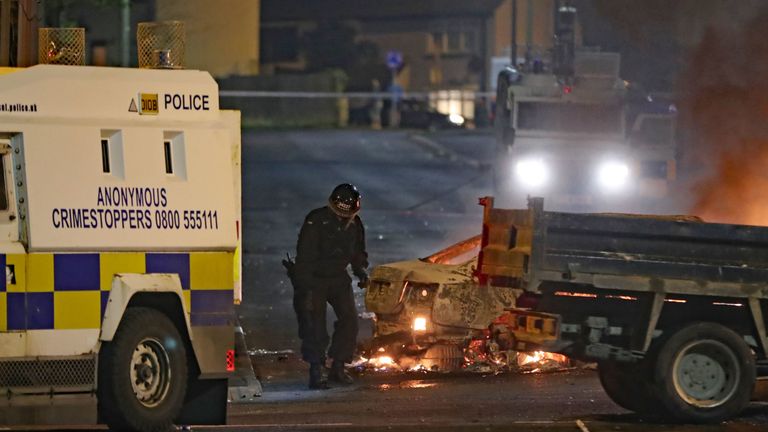 A PSNI officer conducts a search after shots where reportedly fired in Creggan, Londonderry. PRESS ASSOCIATION Photo. Picture date: Thursday April 18, 2019. Photo credit should read: Niall Carson/PA Wire