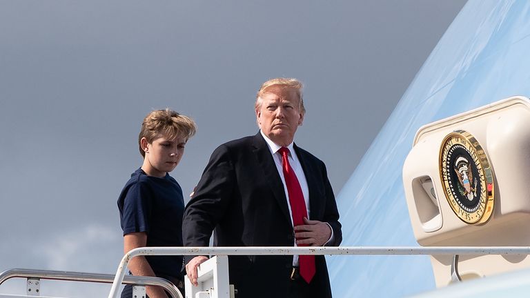 US President Donald Trump and son Barron board Air Force One