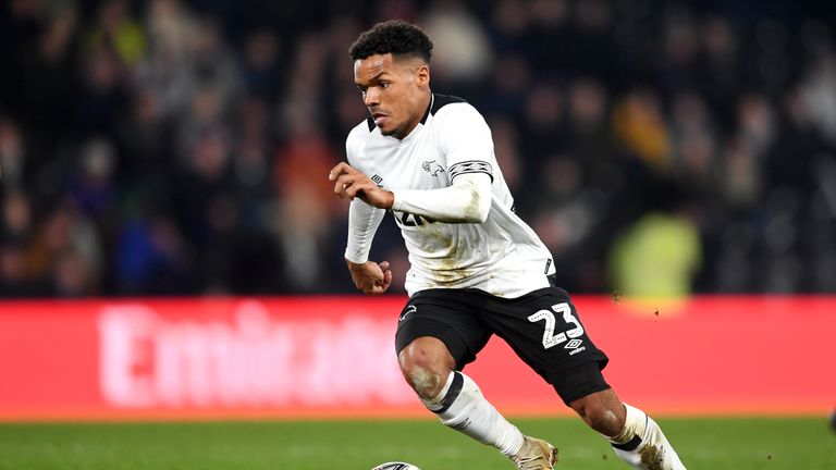 A Brentford season ticket-holder was arrested on suspicion of directing racist abuse at Derby&#39;s Duane Holmes while the player was in the dugout