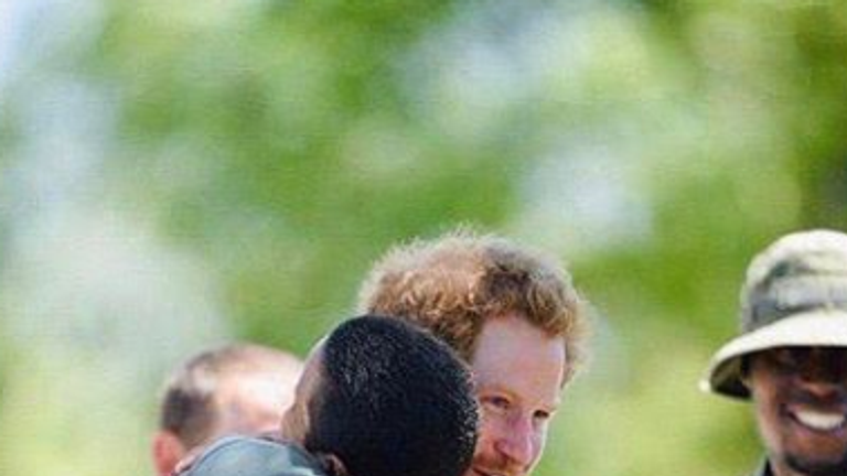 Prince Harry hugging a park ranger in Botswana. Pic:  Instagram/@Sussexroyal