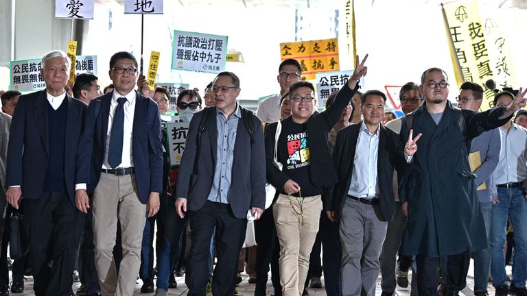 (L-R) Baptist minister Chu Yiu-ming, sociology professor Chan Kin-man, law professor Benny Tai, Raphael Wong, Lee Wing Tat, Shiu Ka Chuen and other pro-democracy campaigners