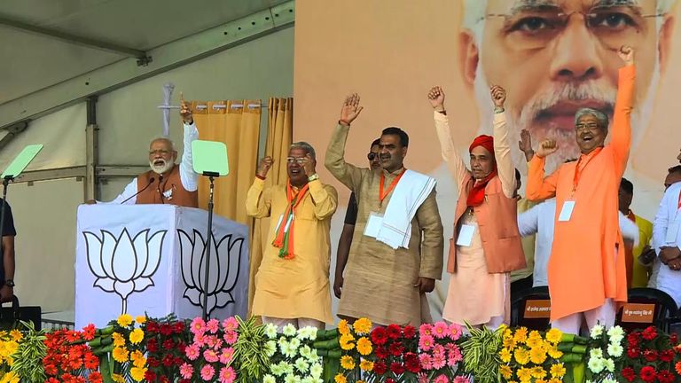 Narendra Modi addresses a crowd during an election rally