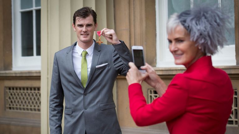 Judy Murray and her son Jamie Murray after he received his OBE in 2016