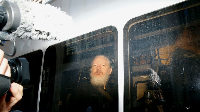 WikiLeaks founder Julian Assange in a police van