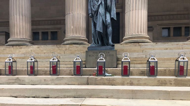 Ninety-six lanterns are lit on the steps of St George's Hall in Liverpool 