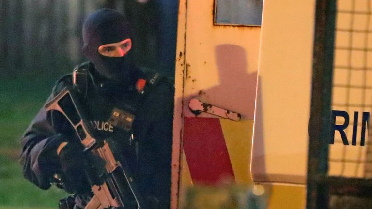 Armed police at the scene of unrest in Creggan, Londonderry. PRESS ASSOCIATION Photo. Picture date: Thursday April 18, 2019. Photo credit should read: Niall Carson/PA Wire