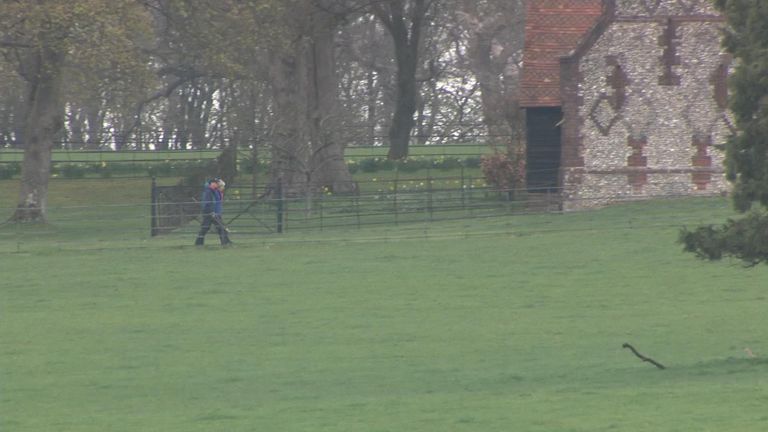 Theresa May and husband take a stroll in the grounds of Chequers as Brexit negotiations continue