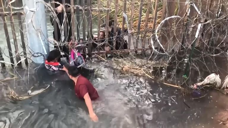 Video released by authorities shows a dramatic and dangerous migrant crossing into the US  involving small children.