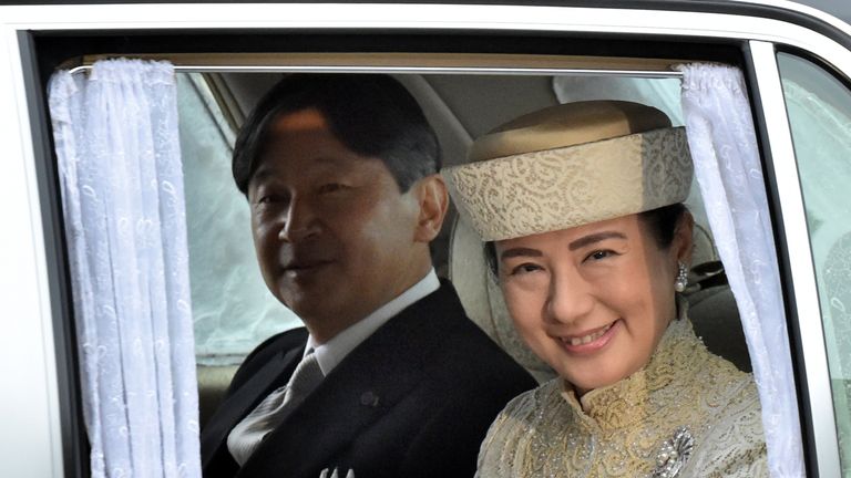 Crown Prince Naruhito and Crown Princess Masako arrive for the abdication ceremony