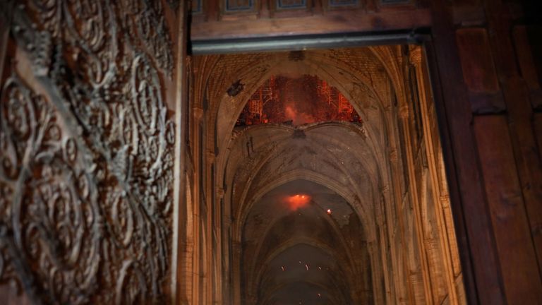 The interior of Notre-Dame is pictured as the fire continues to burn