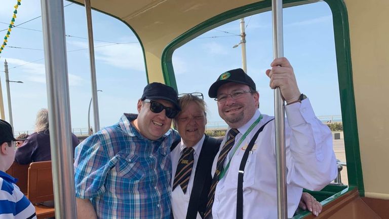 Comedian Peter Kay poses for a photo on a tram in Blackpool
