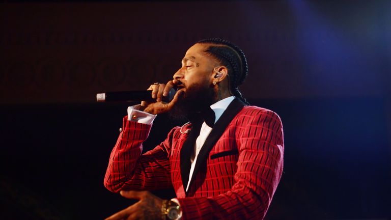 Nipsey Hussle performs onstage at the Warner Music Pre-Grammy Party
