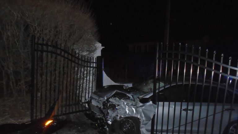 The car crashed into a wall before ricocheting into the gates of Swift's mansion. Pic: Hopkinton Police Department 