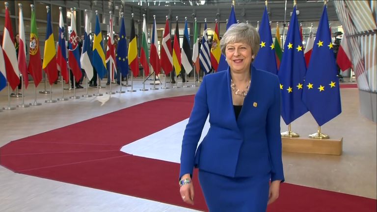 Theresa May appeared in good spirits when she arrived in Brussels