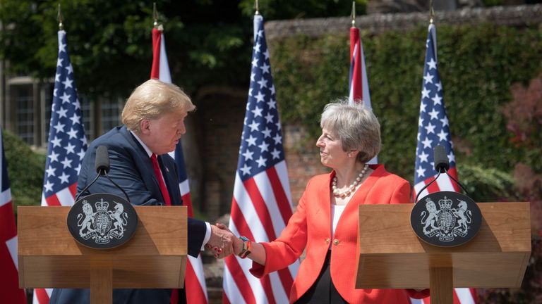 Mrs May and Mr Trump shake hands at Chequers