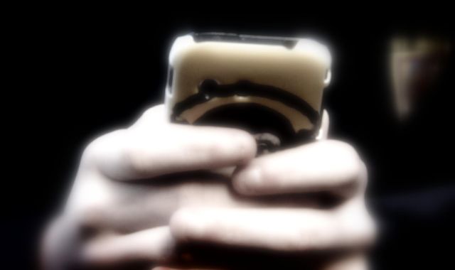 'Corrosive' mobile phones should be totally banned in schools