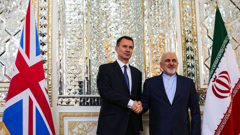 Iran's Foreign Minister Mohammad Javad Zarif (R) shakes hands with Britain's Foreign Secretary Jeremy Hunt as he receives him in the capital Tehran on November 19, 2018. (Photo by ATTA KENARE / AFP)        (Photo credit should read ATTA KENARE/AFP/Getty Images)