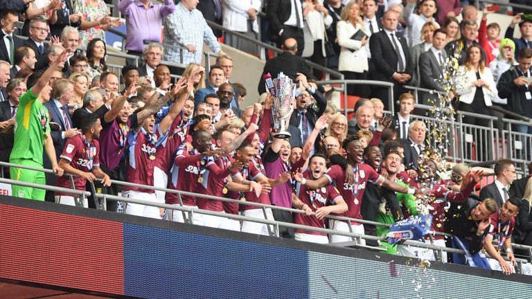 LONDON, ENGLAND - MAY 27: Aston Villa lift the trophy following victory in the Sky Bet Championship Play-off Final match between Aston Villa and Derby County at Wembley Stadium on May 27, 2019 in London, United Kingdom. (Photo by Mike Hewitt/Getty Images)