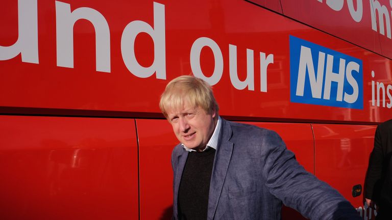CHESTER-LE-STREET, ENGLAND - MAY 30: Boris Johnson MP walks past the battle bus during a visit Chester-Le-Street Cricket Club as part of the Brexit tour on May 30, 2016 in Chester-Le-Street, England. Boris Johnson and the Vote Leave campaign are touring the UK in their Brexit Battle Bus on a campaign hoping to persuade voters to back leaving the European Union in the June 23rd referendum. (Photo by Ian Forsyth/Getty Images)