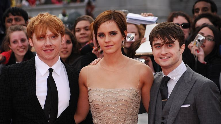 LONDON, ENGLAND - JULY 07:  (L-R) Rupert Grint, Emma Watson and Daniel Radcliffe attend the World Premiere of Harry Potter and The Deathly Hallows - Part 2 at Trafalgar Square on July 7, 2011 in London, England.  (Photo by Ian Gavan/Getty Images)