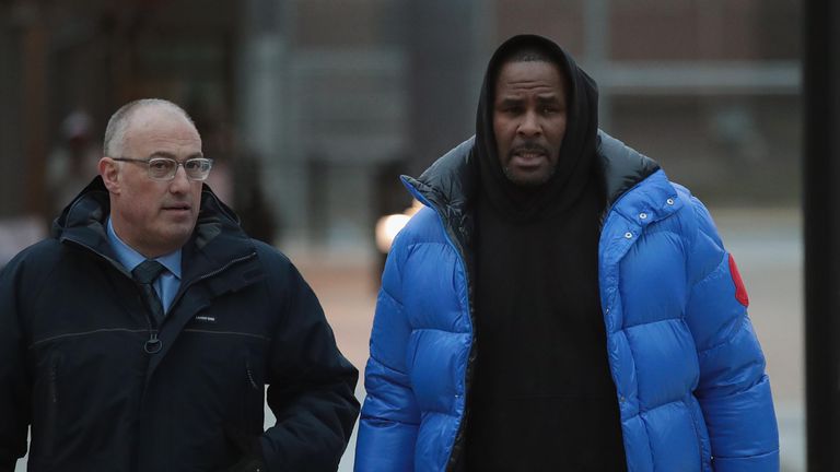 CHICAGO, ILLINOIS - FEBRUARY 25: R&B singer R. Kelly (R) and his attorney Steve Greenberg leave Cook County jail after Kelly posted $100 thousand bond on February 25, 2019 in Chicago, Illinois.  Kelly was being held after turning himself in to face ten counts of aggravated sexual abuse.  (Photo by Scott Olson/Getty Images)