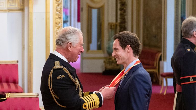 Andy Murray receives his knighthood from Prince Charles at Buckingham Palace