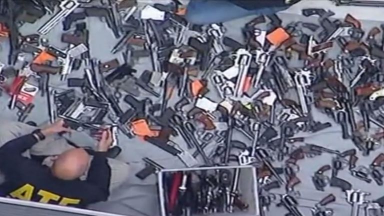 Hundreds of guns were seized in the Los Angeles home raid. Pic: KABC