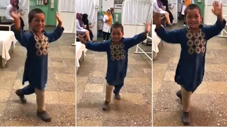 Afghan boy dances with prosthetic leg in kabul