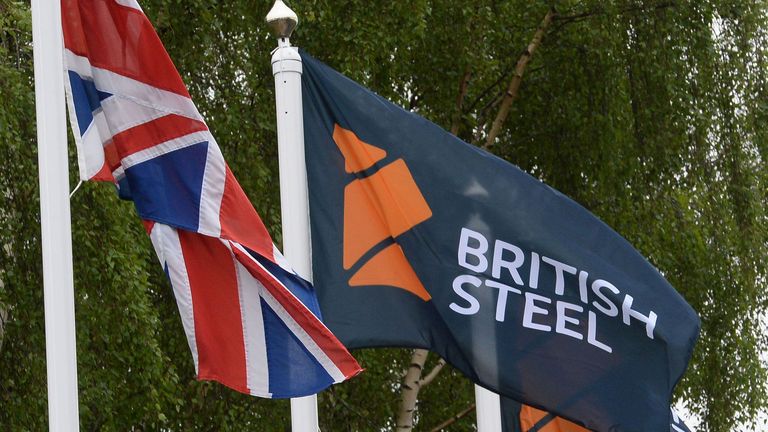 The British Steel flag flies at the entrance to the steelworks in Scunthorpe