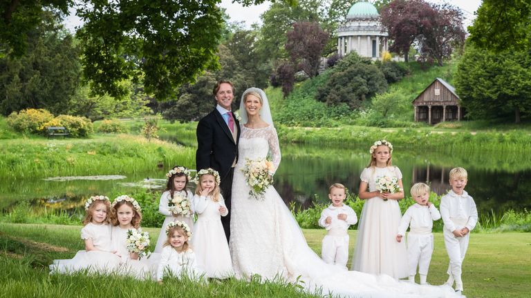 Smiling Queen seen in Lady Gabriella's wedding day photos