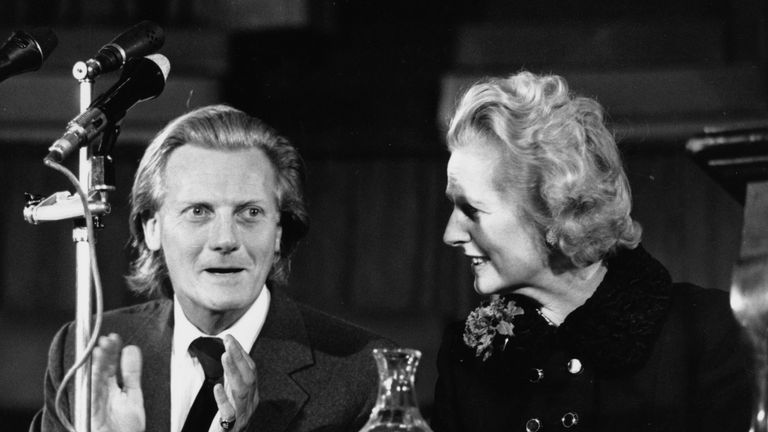 Conservative Party leader Margaret Thatcher and Shadow Trade Minister Michael Heseltine speaking at a rally organized by the Chamber of Trade, at Central Hall in Westminster, London, February 17th 1975. (Photo by Wesley/Keystone/Getty Images)