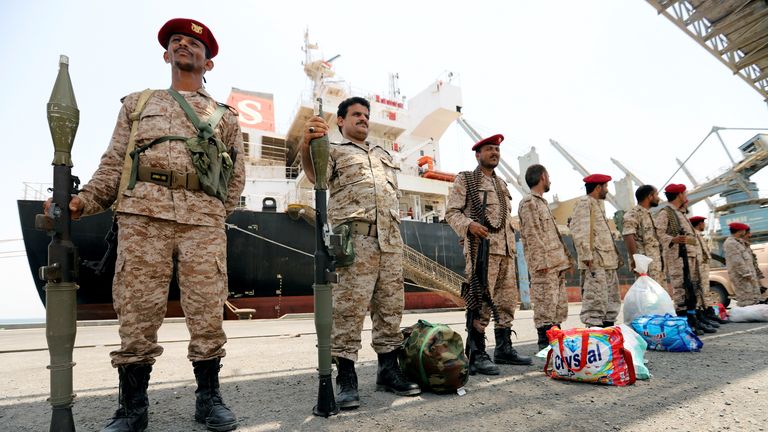 Houthi forces are seen withdrawing from Saleef port in Hodeidah province, Yemen